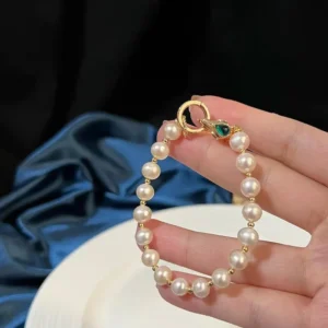 AAA Quality, 10-11mm white freshwater pearl bracelet, 18K Gold